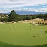 Backyard putting green installation in Castle Rock with artificial turf and chipping areas